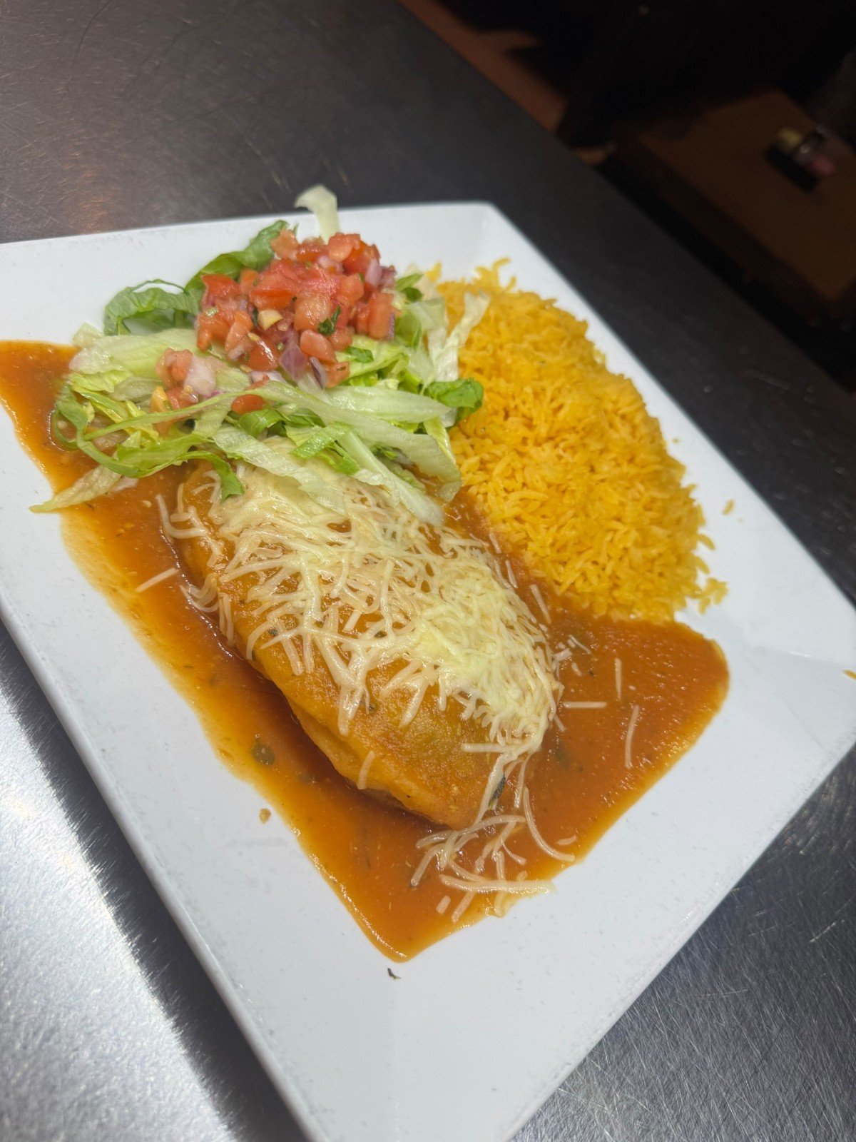 Burrito served with rice